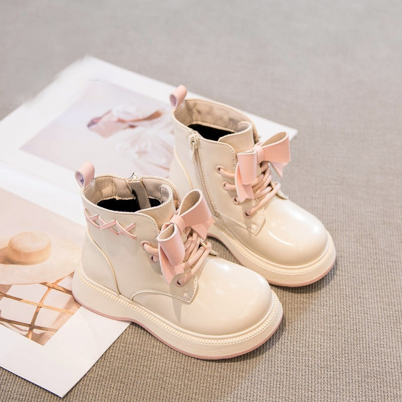 Pretty in punk bow combat boots
