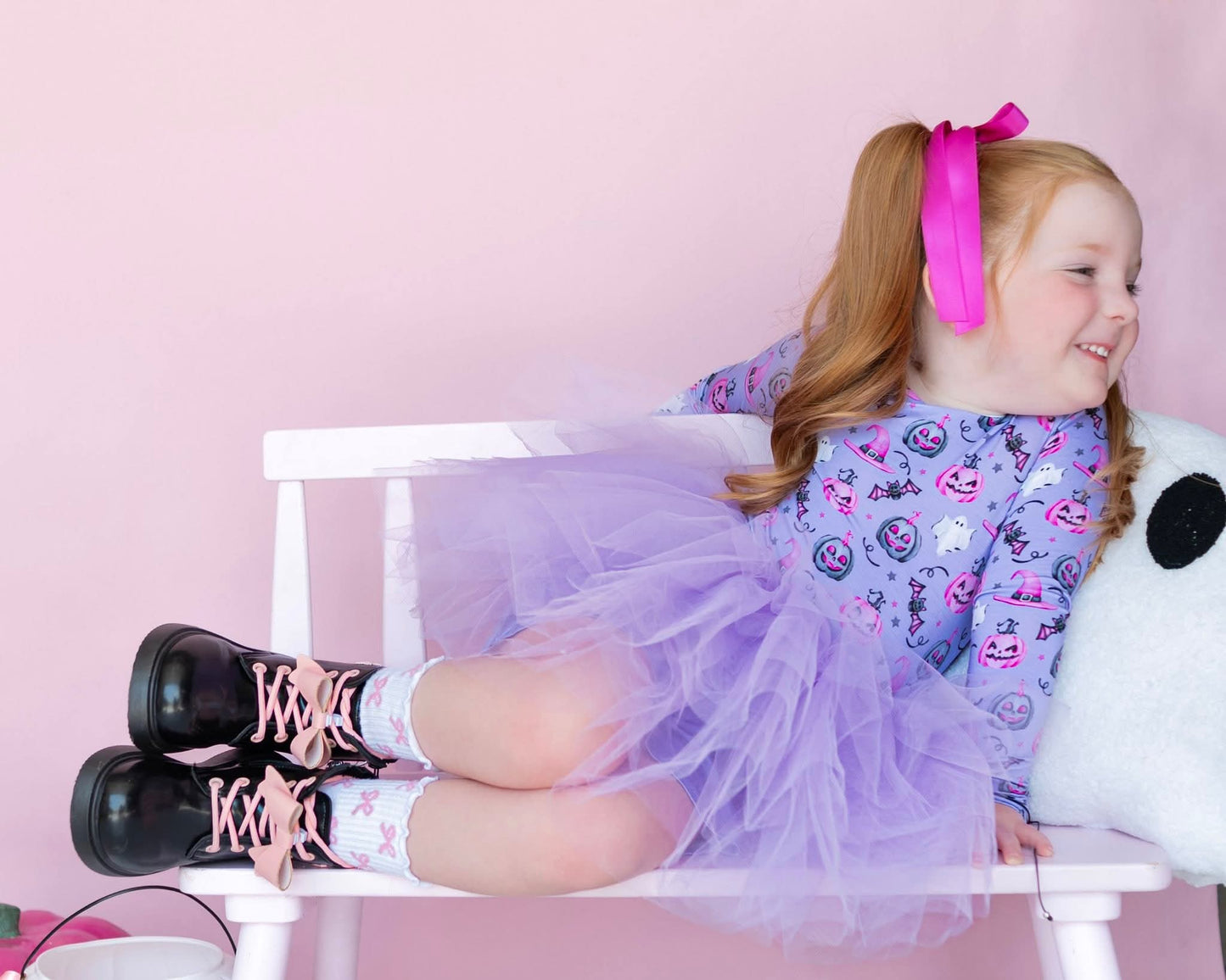 Pretty in punk bow combat boots