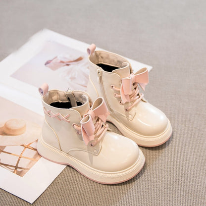Pretty in punk bow combat boots