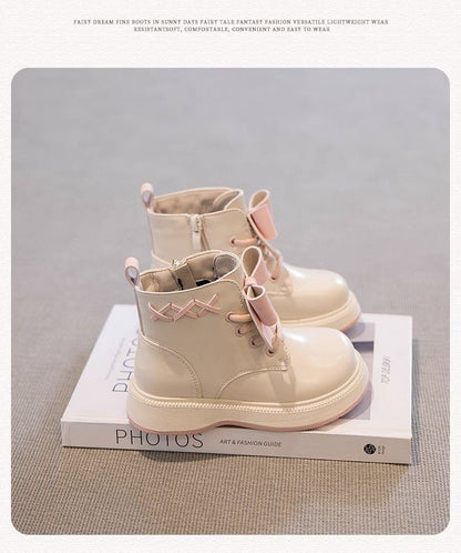 Pretty in punk bow combat boots