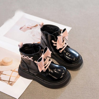 Pretty in punk bow combat boots