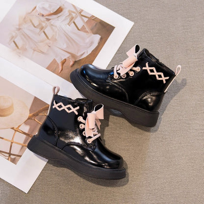 Pretty in punk bow combat boots