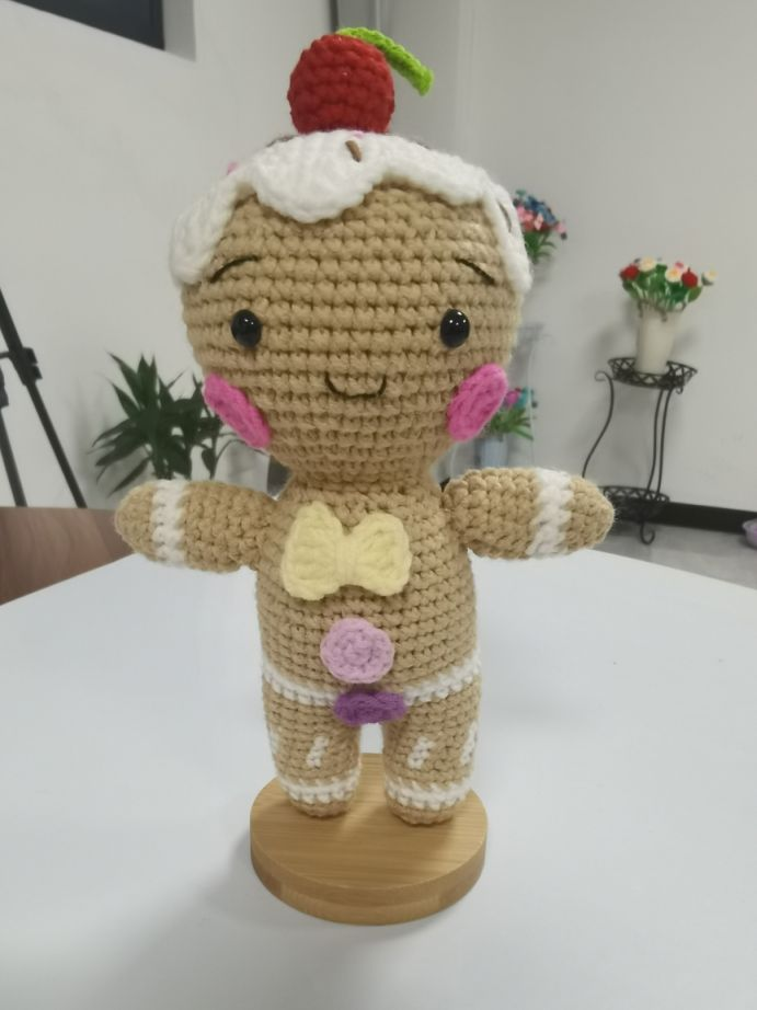 Gingerbread boy and girl crochet dolls