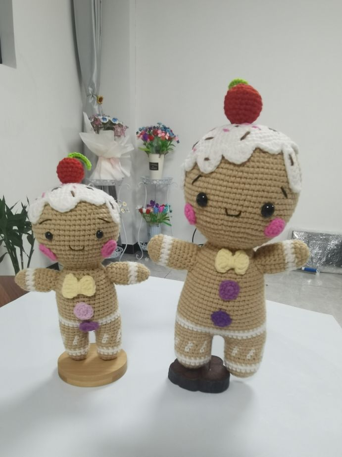 Gingerbread boy and girl crochet dolls