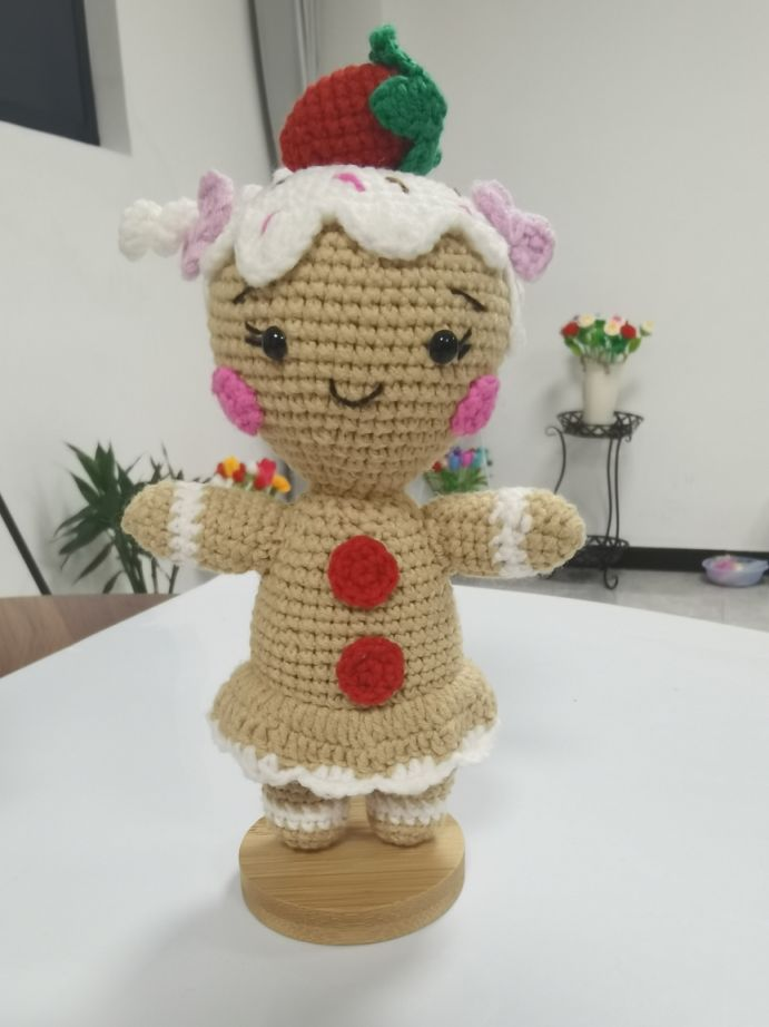 Gingerbread boy and girl crochet dolls