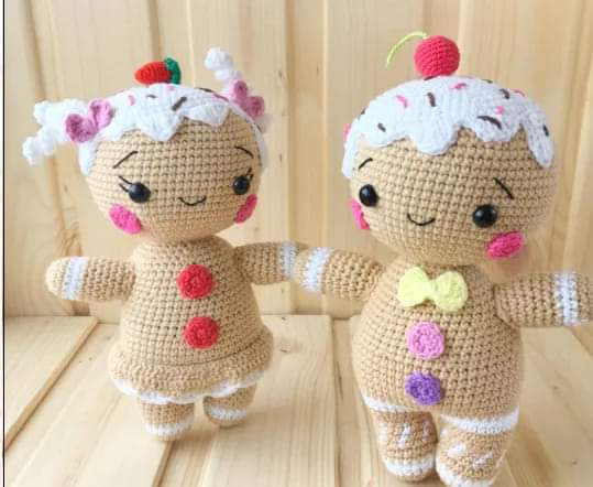 Gingerbread boy and girl crochet dolls