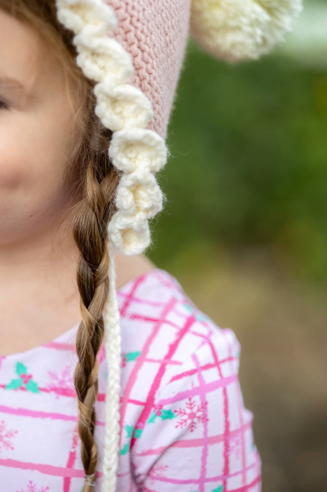 Crochet pixie hat with pom and contrast trim