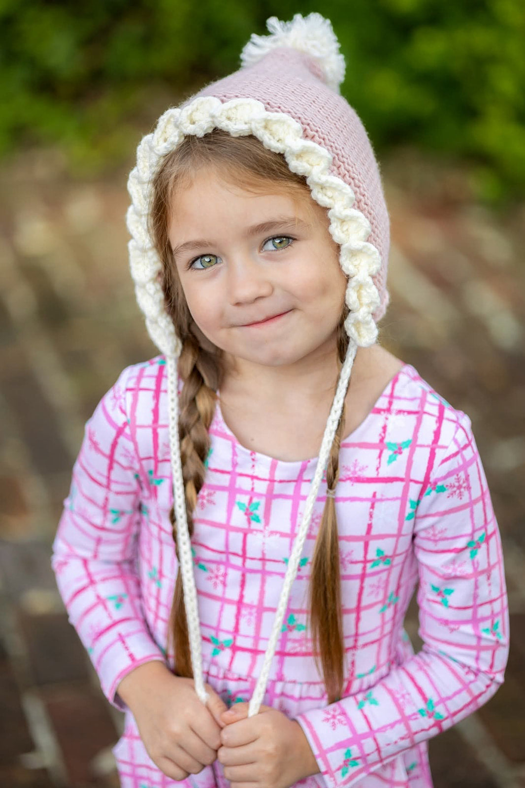 Crochet pixie hat with pom and contrast trim