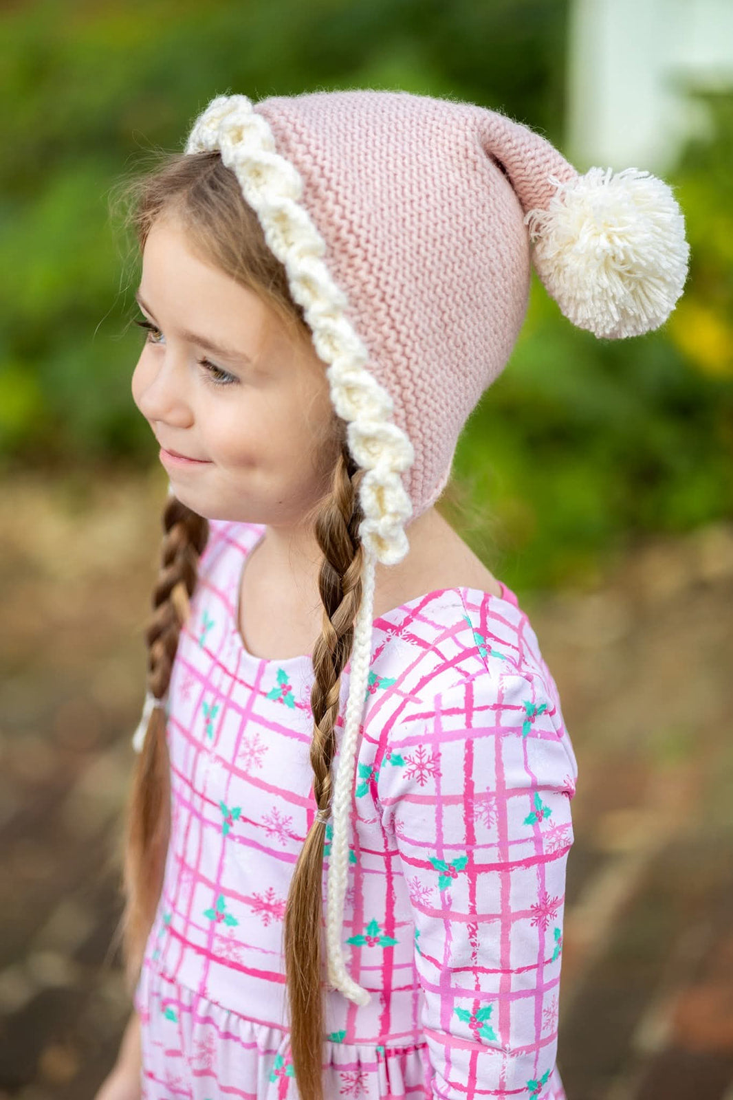 Crochet pixie hat with pom and contrast trim